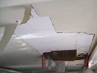 A ceiling damged by a pipe burst.
